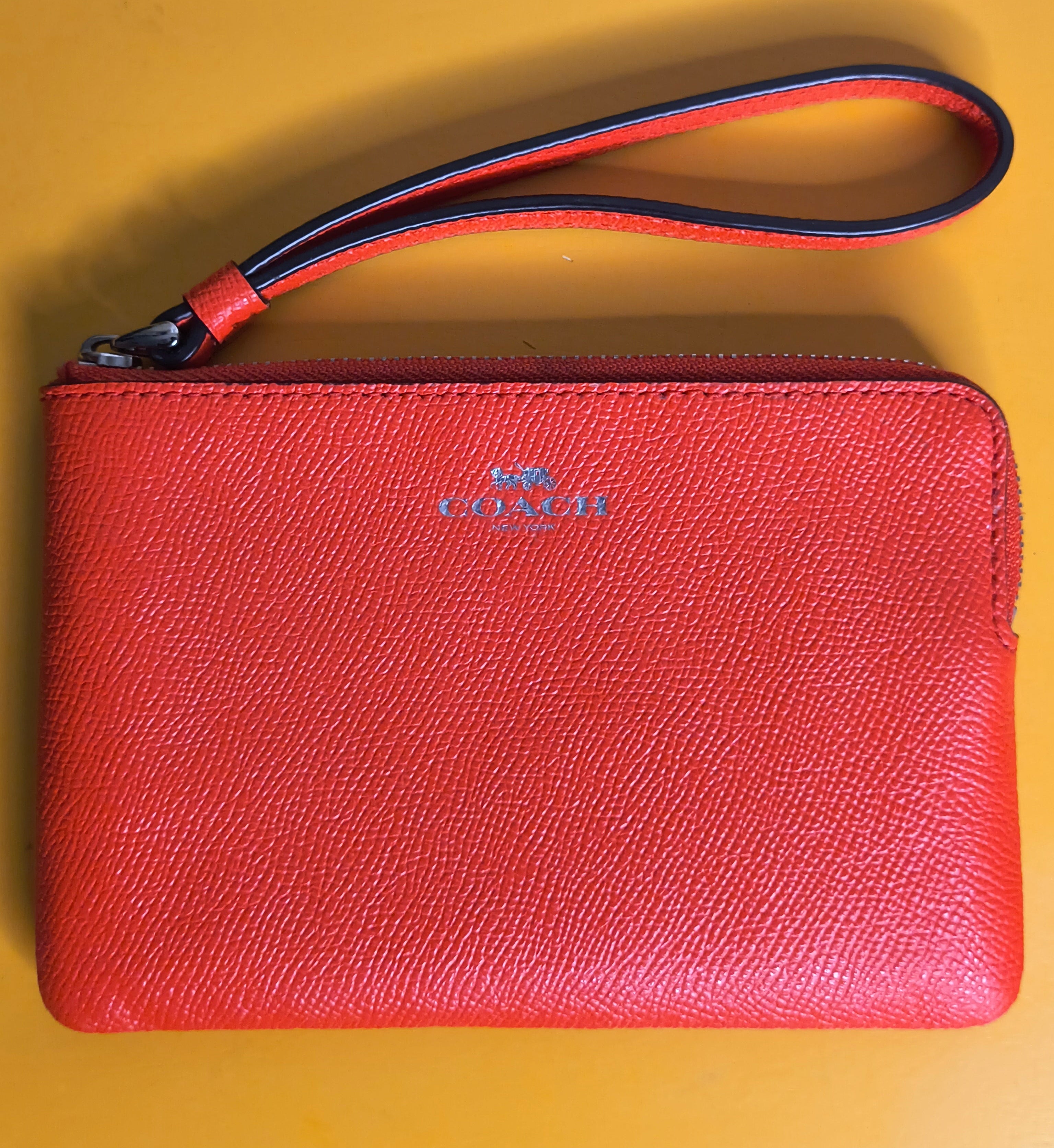 Coach Pebbled Leather Zip Wristlet Wallet in Bright Coral Red